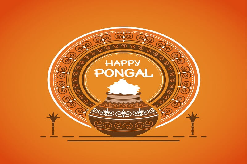 Ornamental pongal rice pot on orange background