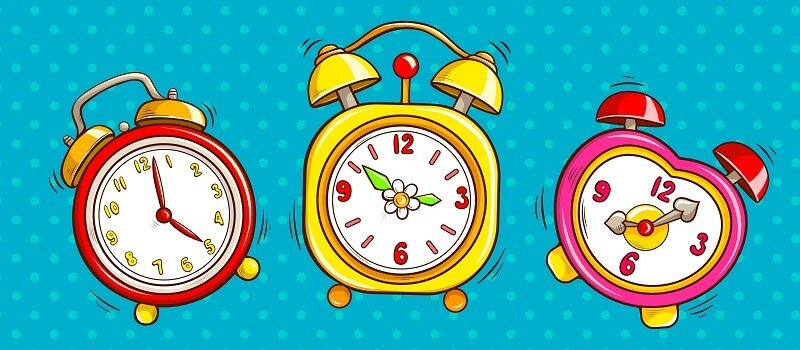 Pop art alarm clocks set on half tone background