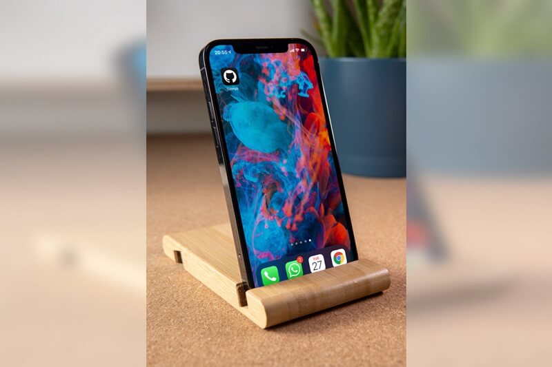 iPhone 12 Pro on wooden Stand Mockup